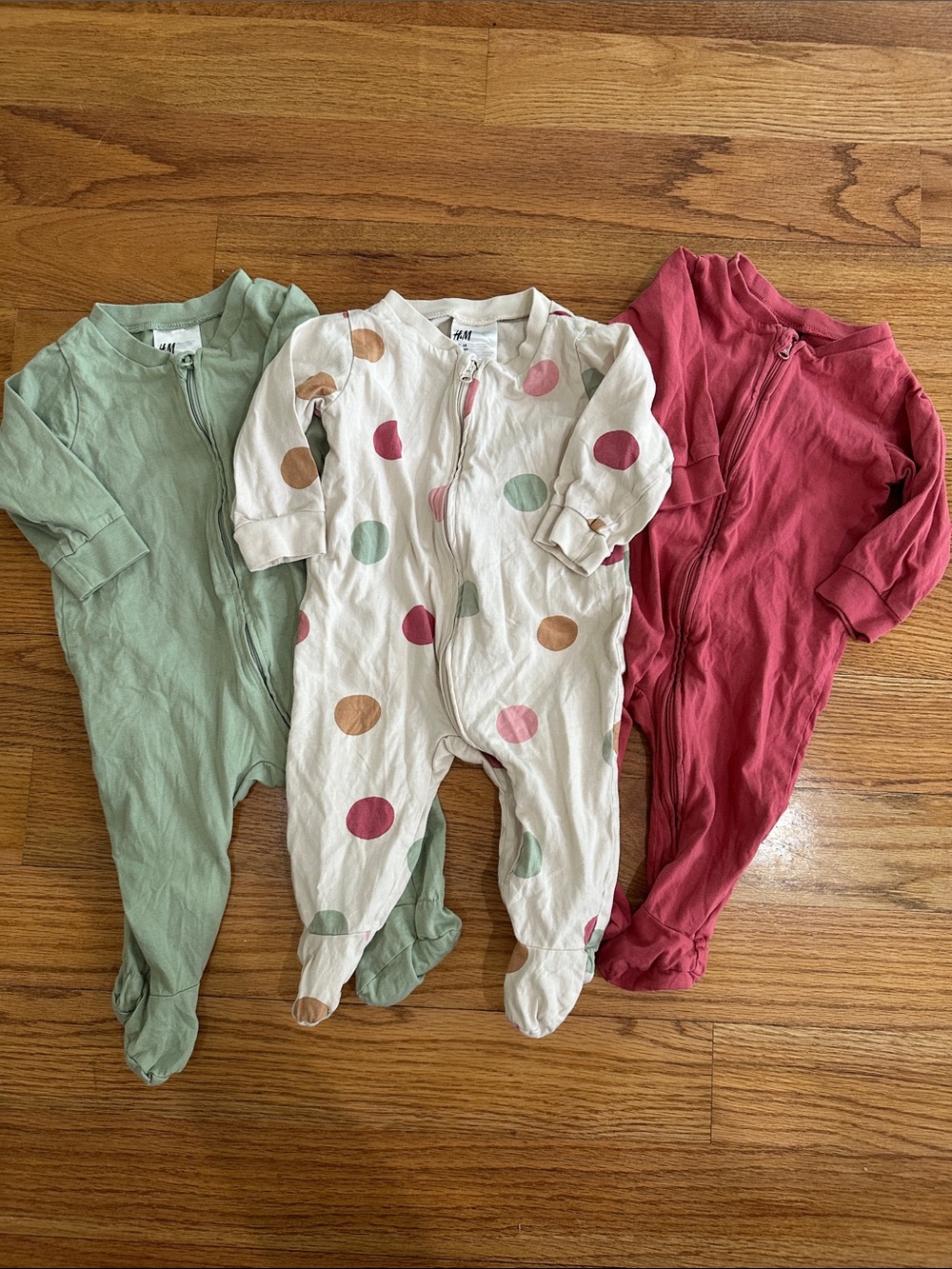 H&M Three-Pack Baby Footed Sleepers in Sage, White Polka Dot & Raspberry